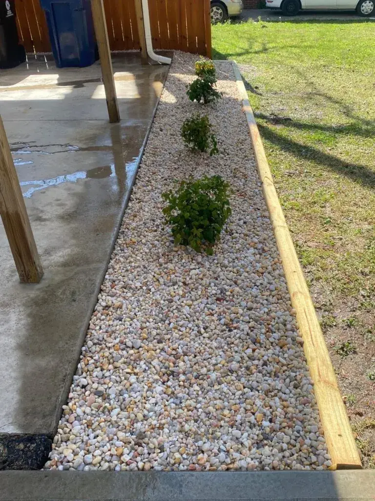 Gravel drainage path installation for water management